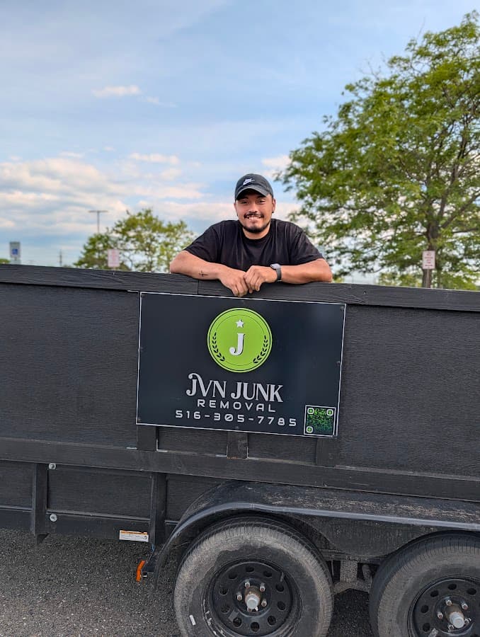 Independent service professional with a JVN Junk Removal truck.